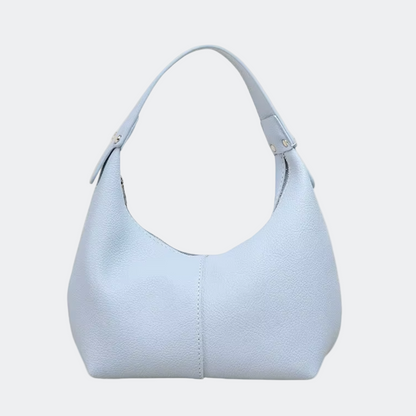Light blue handbag on a white background
