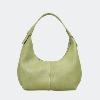 Green handbag on a white background