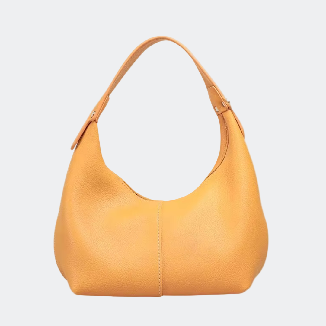 Yellow handbag on a white background