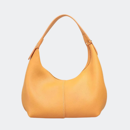 Yellow handbag on a white background