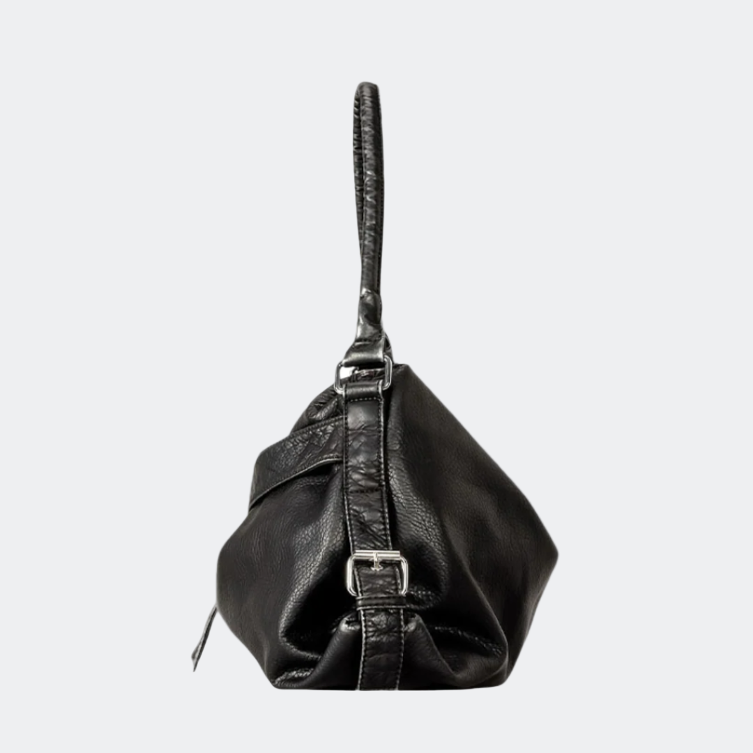 Black leather handbag on a white background