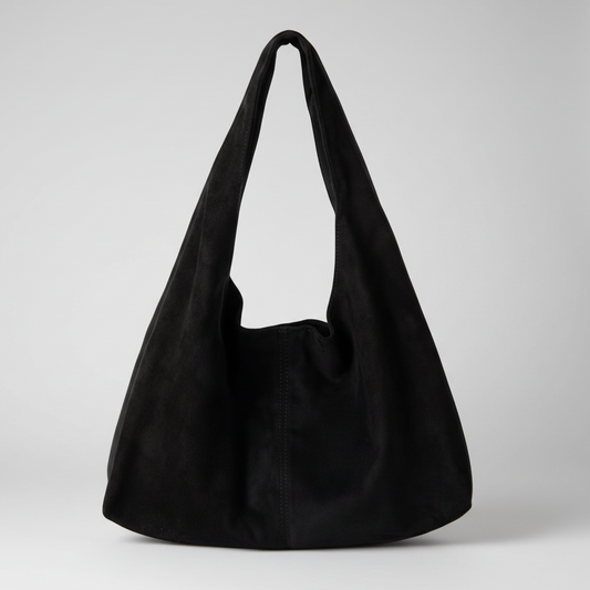 Black handbag on a white background